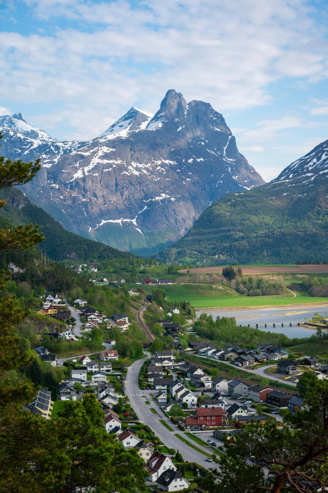 Hikers on Fossestien waterfall trail through the Sognefjord valley